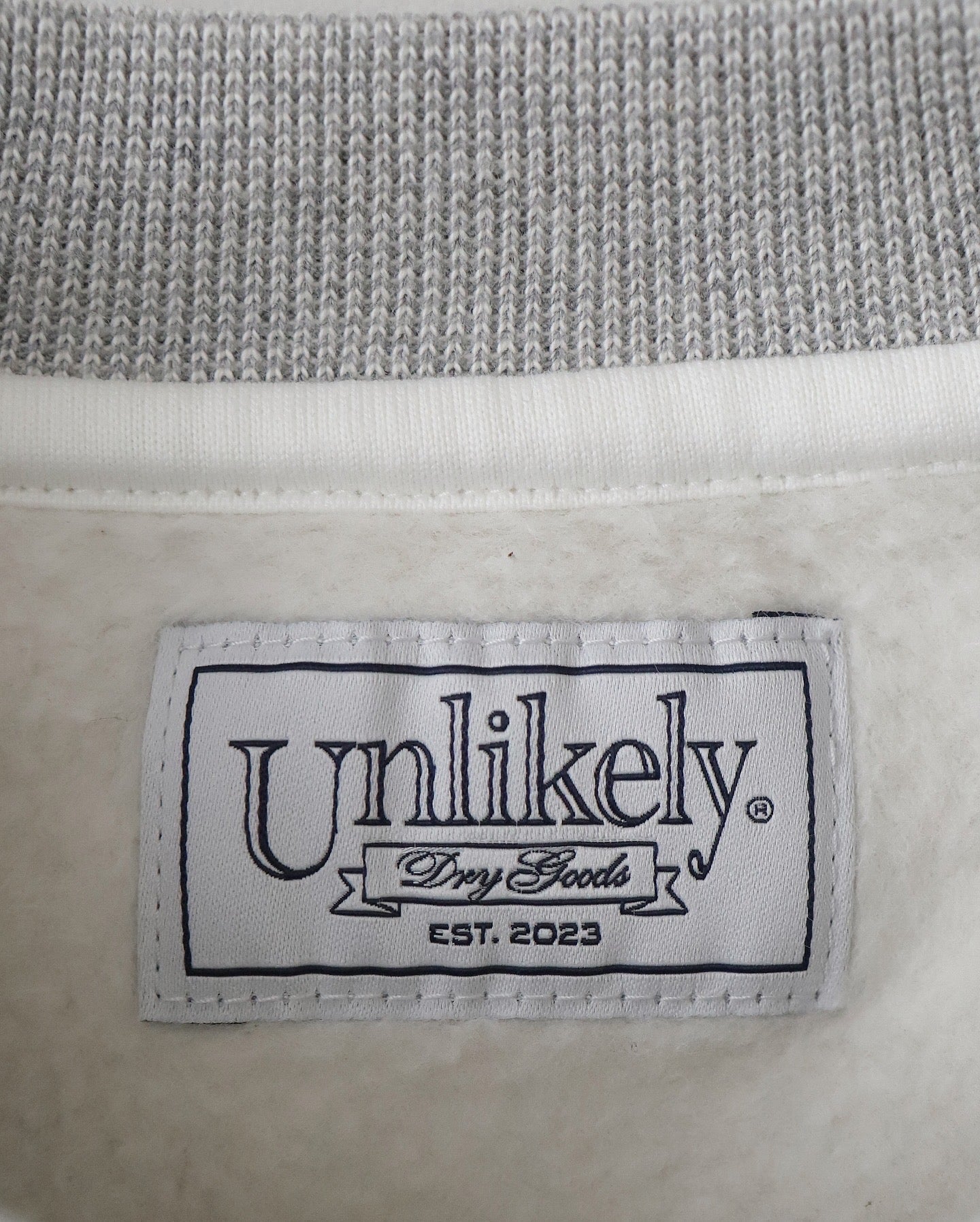 UNLIKELY SIMPLE SWEAT CREW "CENTRAL PARK"