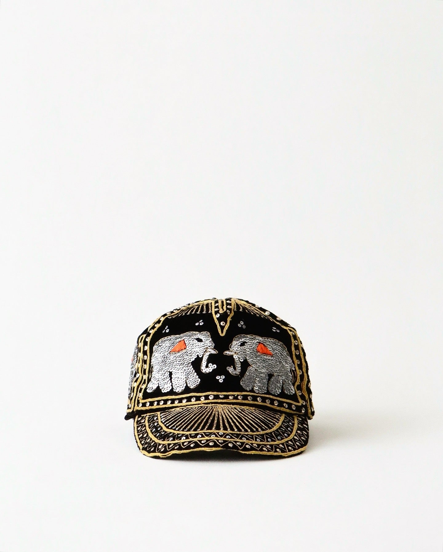 ELEPHANT SEQUIN CAPS BRONZE