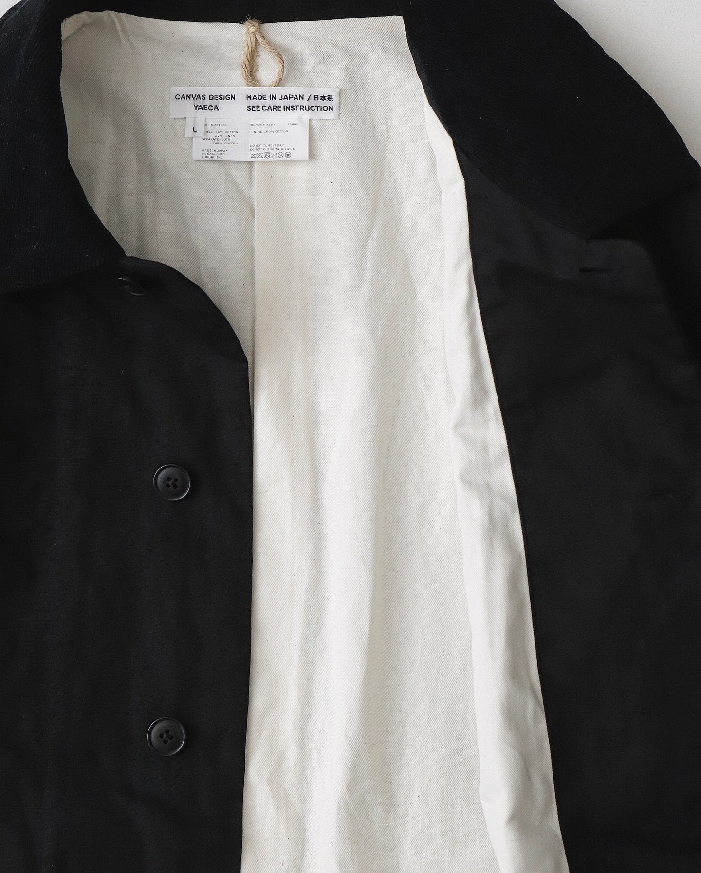 SHORT OVERCOAT OILED