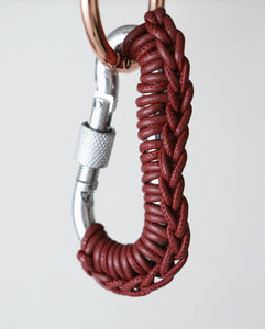 COGNAC LEATHER CARABINER BY AURELIE MATHIGOT