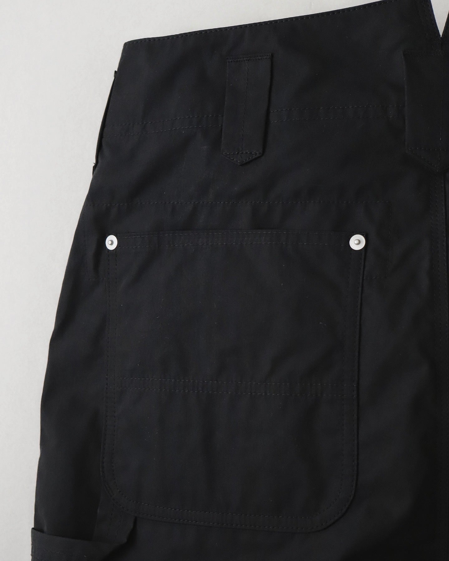 PLEATED LEG TROUSERS