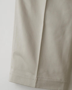 DOUBLE PLEATED CHINO TROUSERS