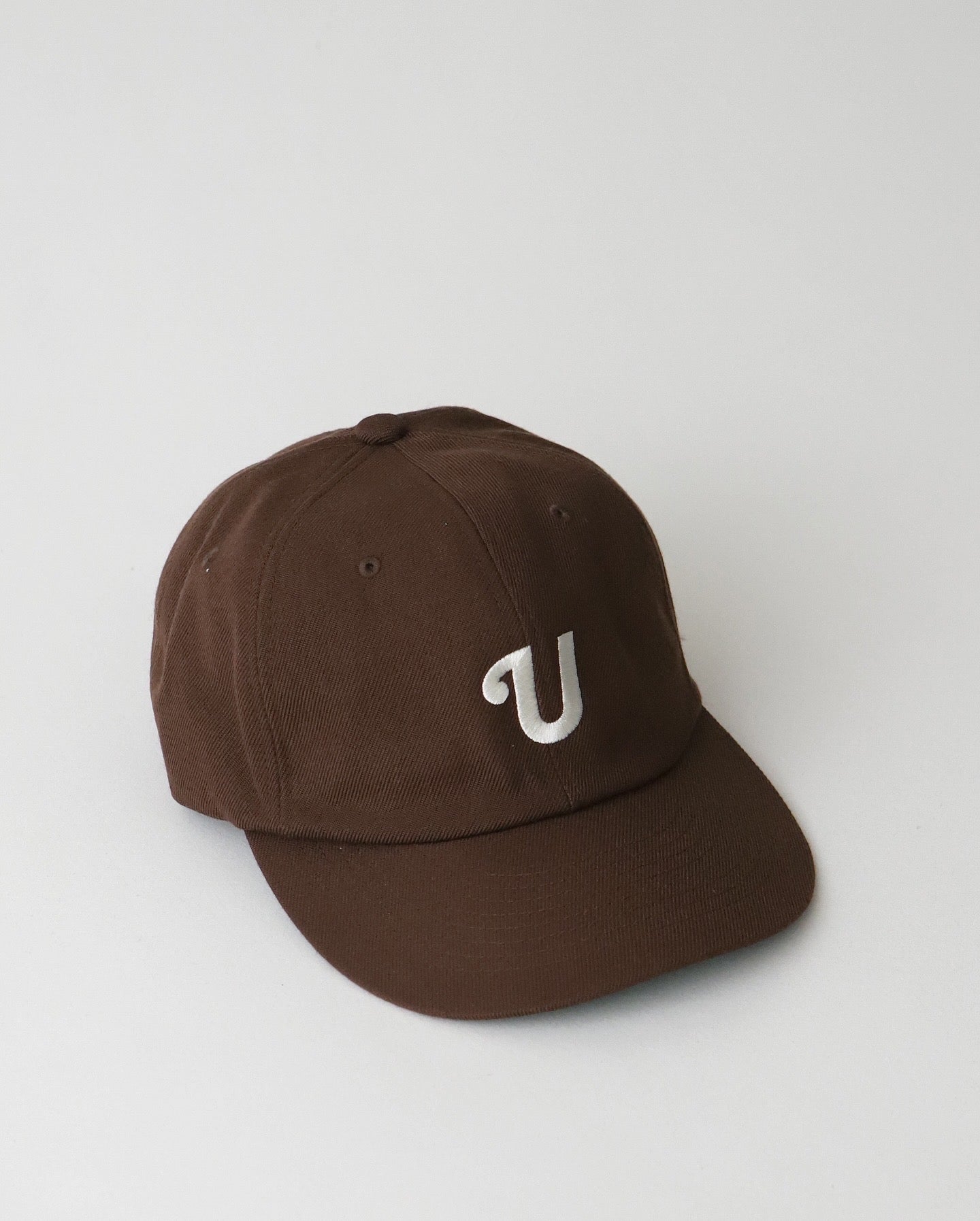 UNLIKELY TEAM CAP