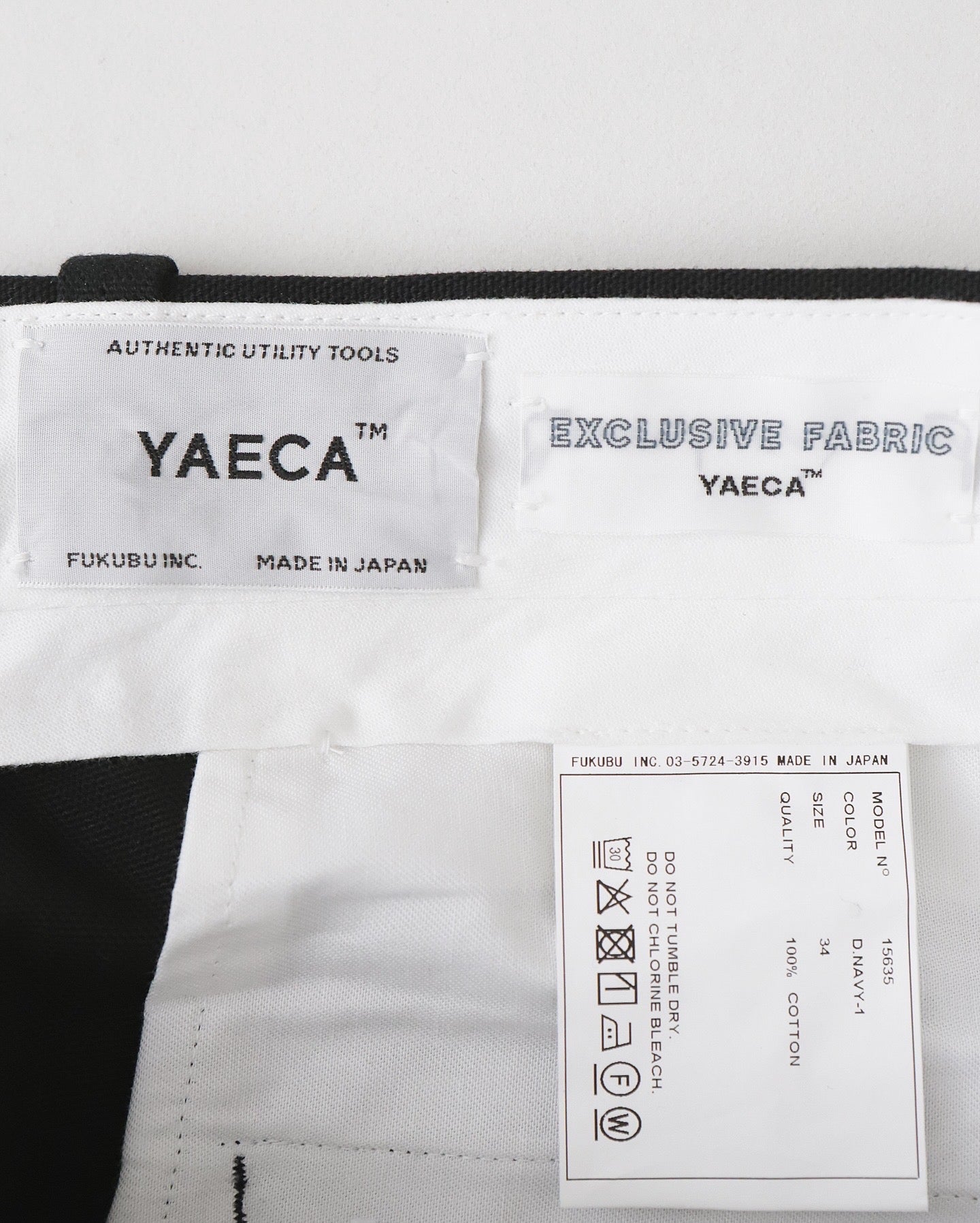 TUCK STRAIGHT TROUSERS