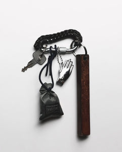BLACK LEATHER CARABINER BY AURELIE MATHIGOT