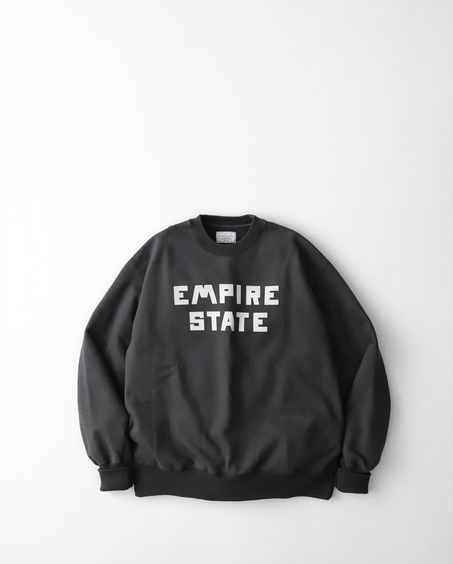 UNLIKELY SIMPLE SWEAT CREW "EMPIRE STATE"