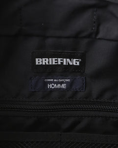 BRIEFINGS SLING BAG｜ESTER CORDURA DIA RIP × SUEDE NYLON ESTER