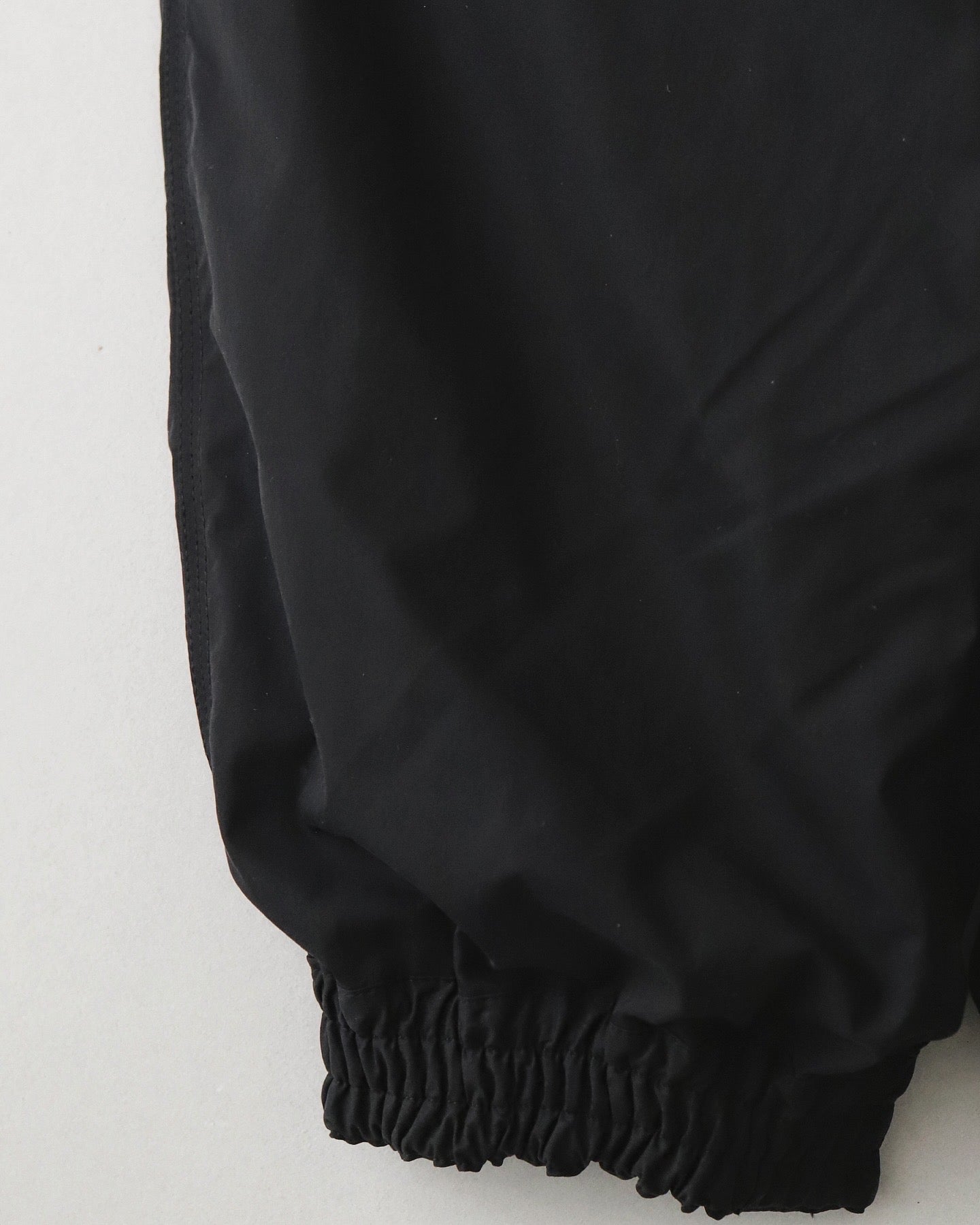 PLEATED LEG TROUSERS