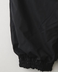 PLEATED LEG TROUSERS
