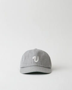 UNLIKELY TEAM CAP