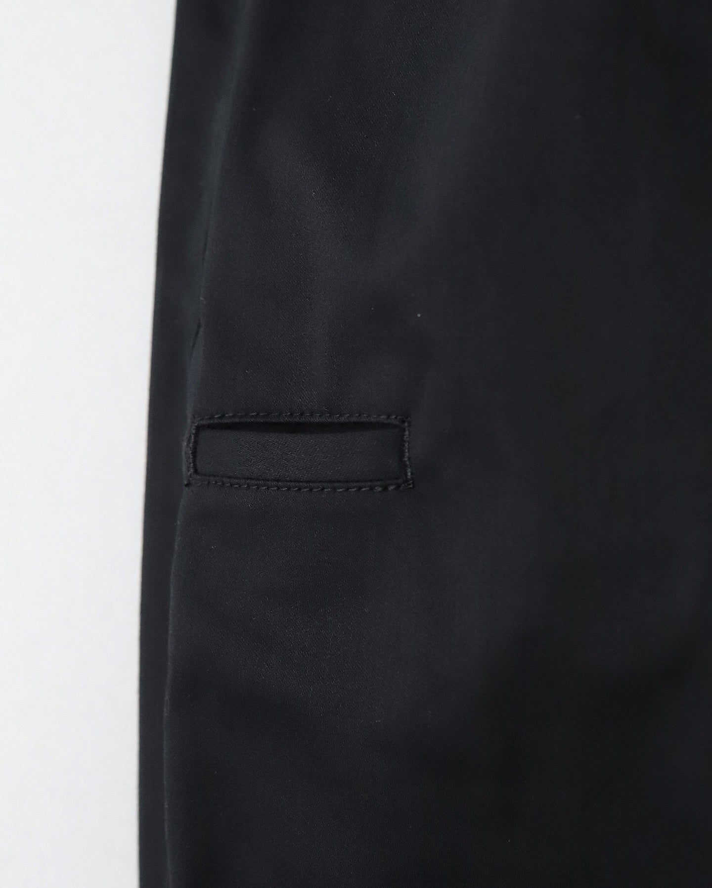 PLEATED BARREL LEG TROUSERS