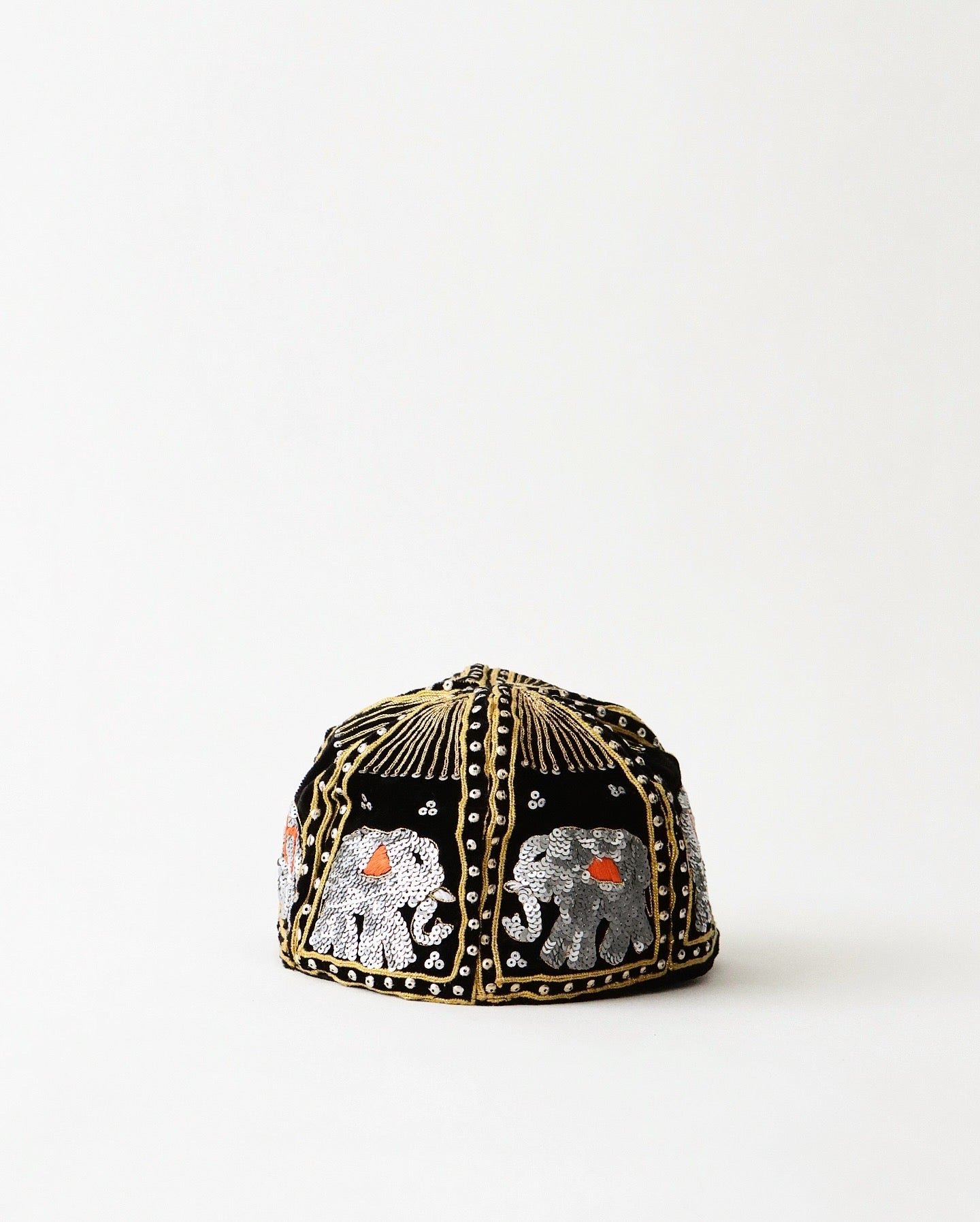ELEPHANT SEQUIN CAPS BRONZE