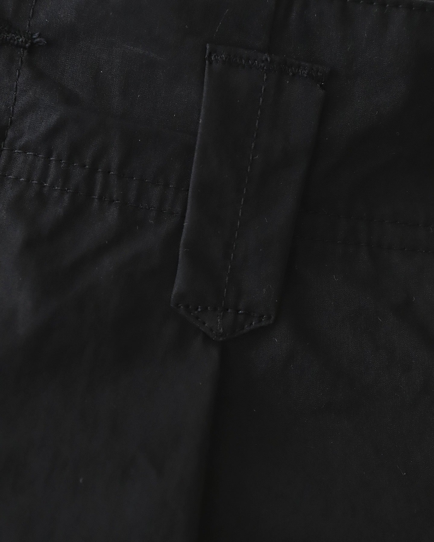 PLEATED LEG TROUSERS