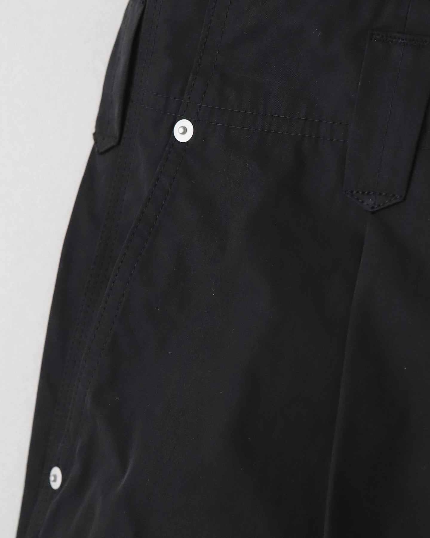 PLEATED LEG TROUSERS