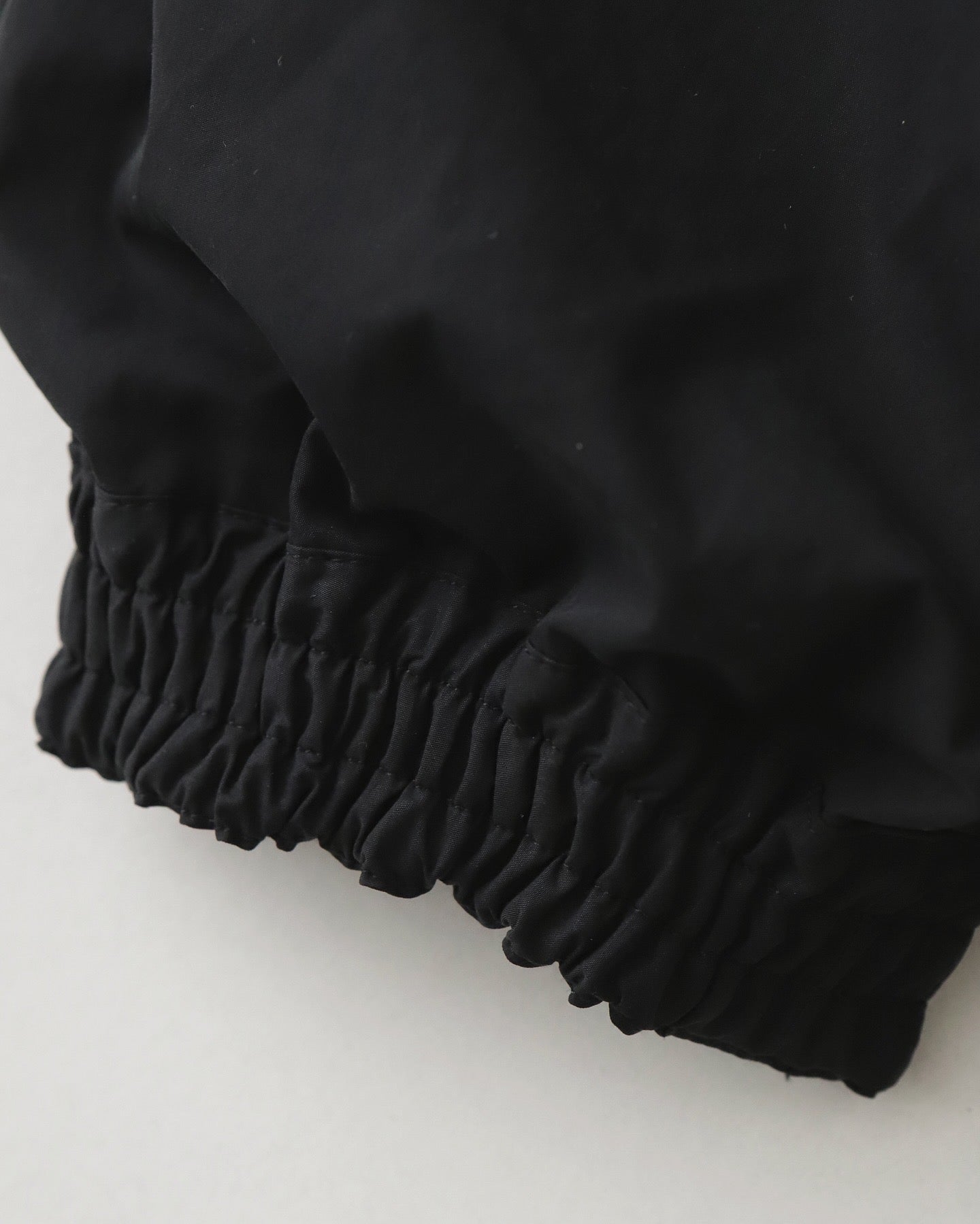 PLEATED LEG TROUSERS