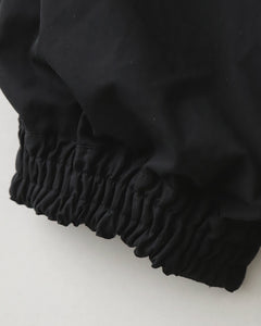 PLEATED LEG TROUSERS