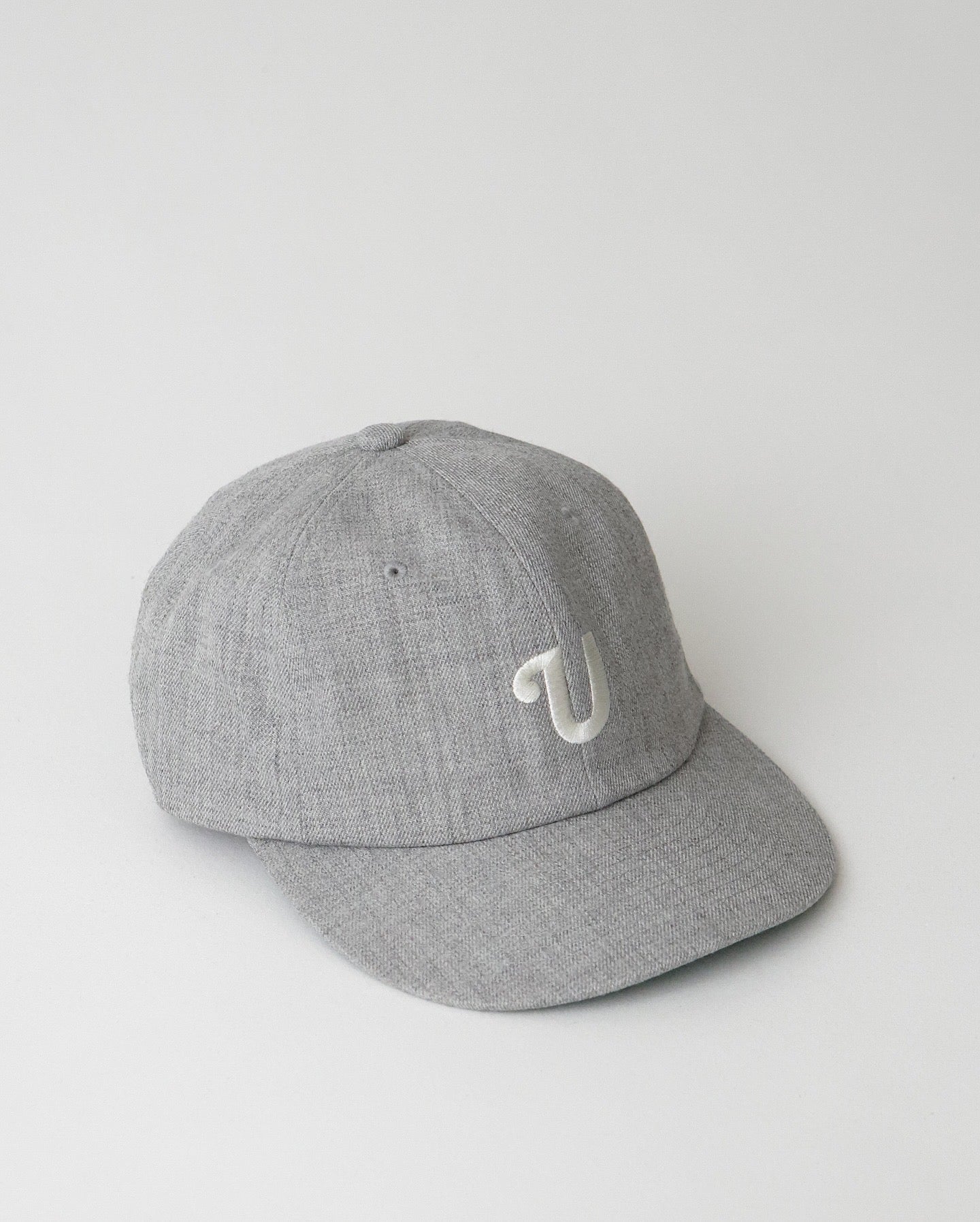 UNLIKELY TEAM CAP