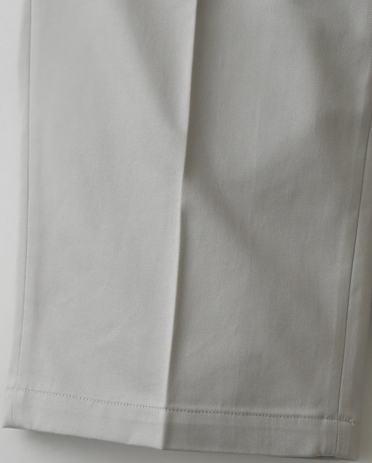 OUT TUCK WIDE TAPERED PANTS