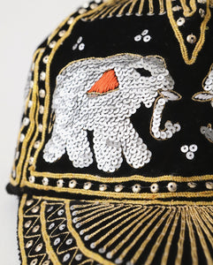 ELEPHANT SEQUIN CAPS BRONZE