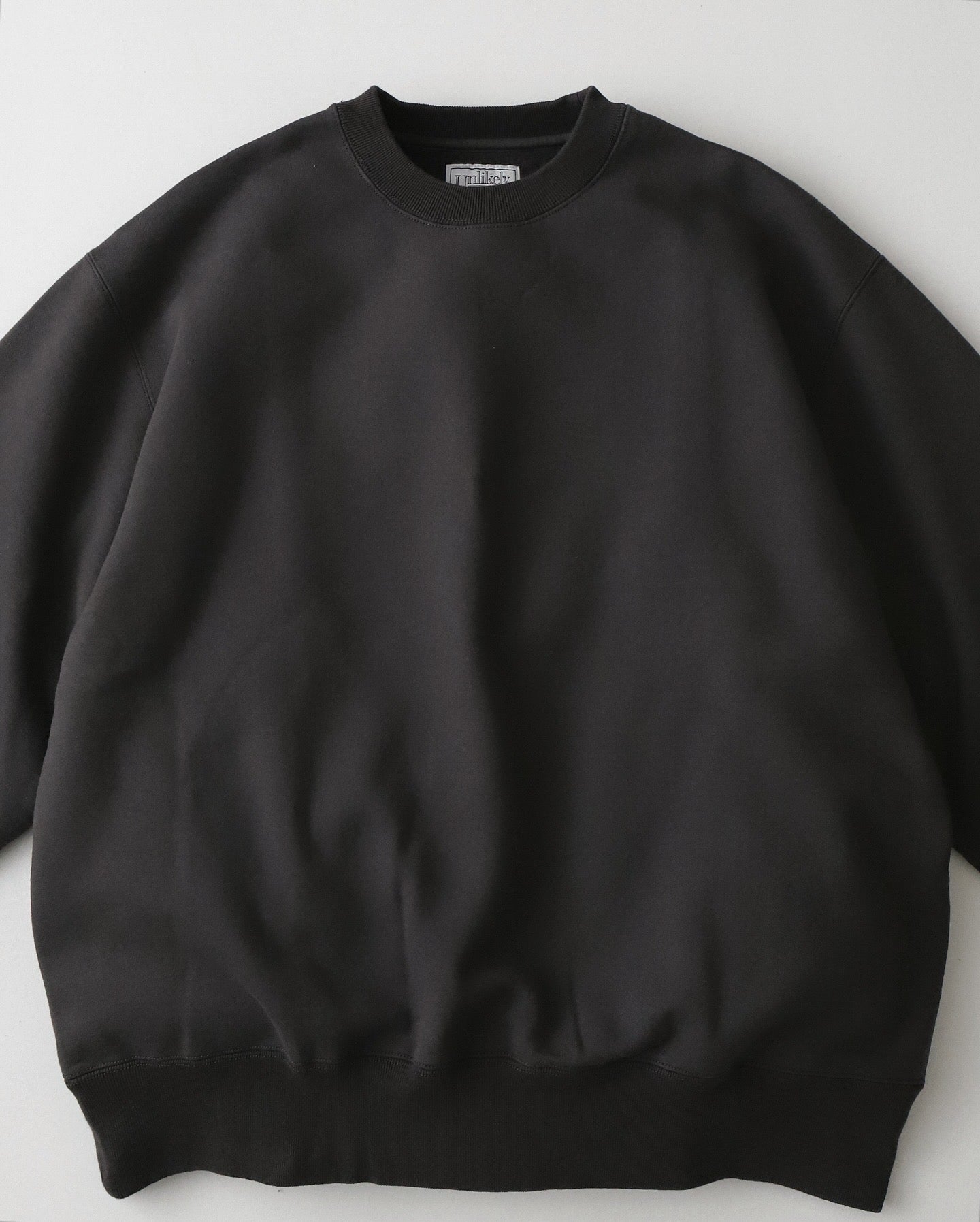 UNLIKELY SIMPLE SWEAT CREW "RESERVE"