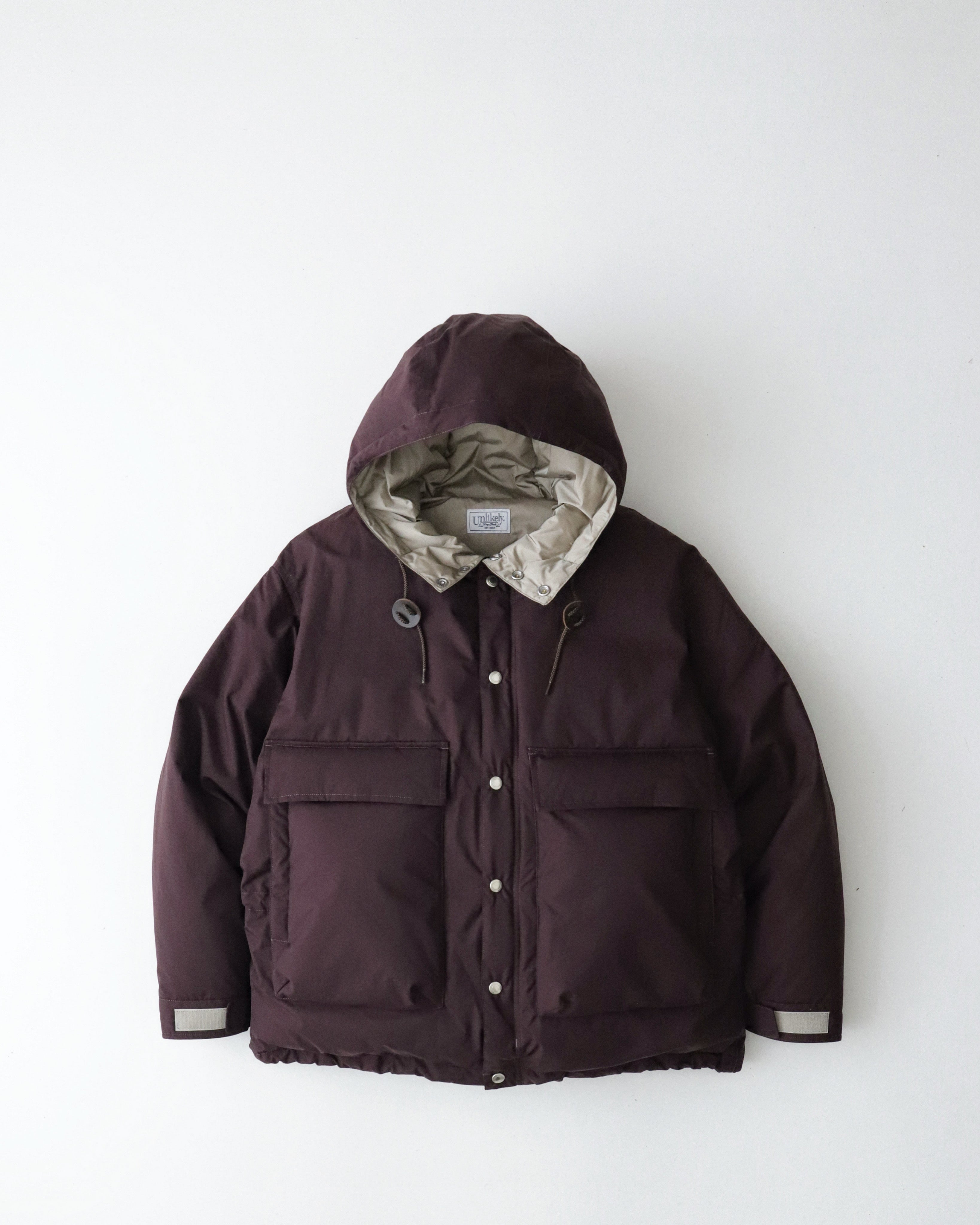 UNLIKELY ALPINE DOWN PARKA