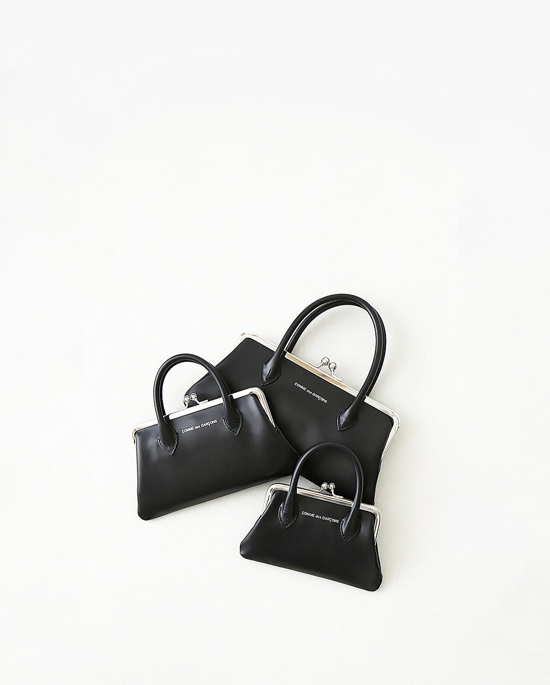Wallet COMME des GARCONS LARGE WALLET WITH CLASP HANDLES – NCNR