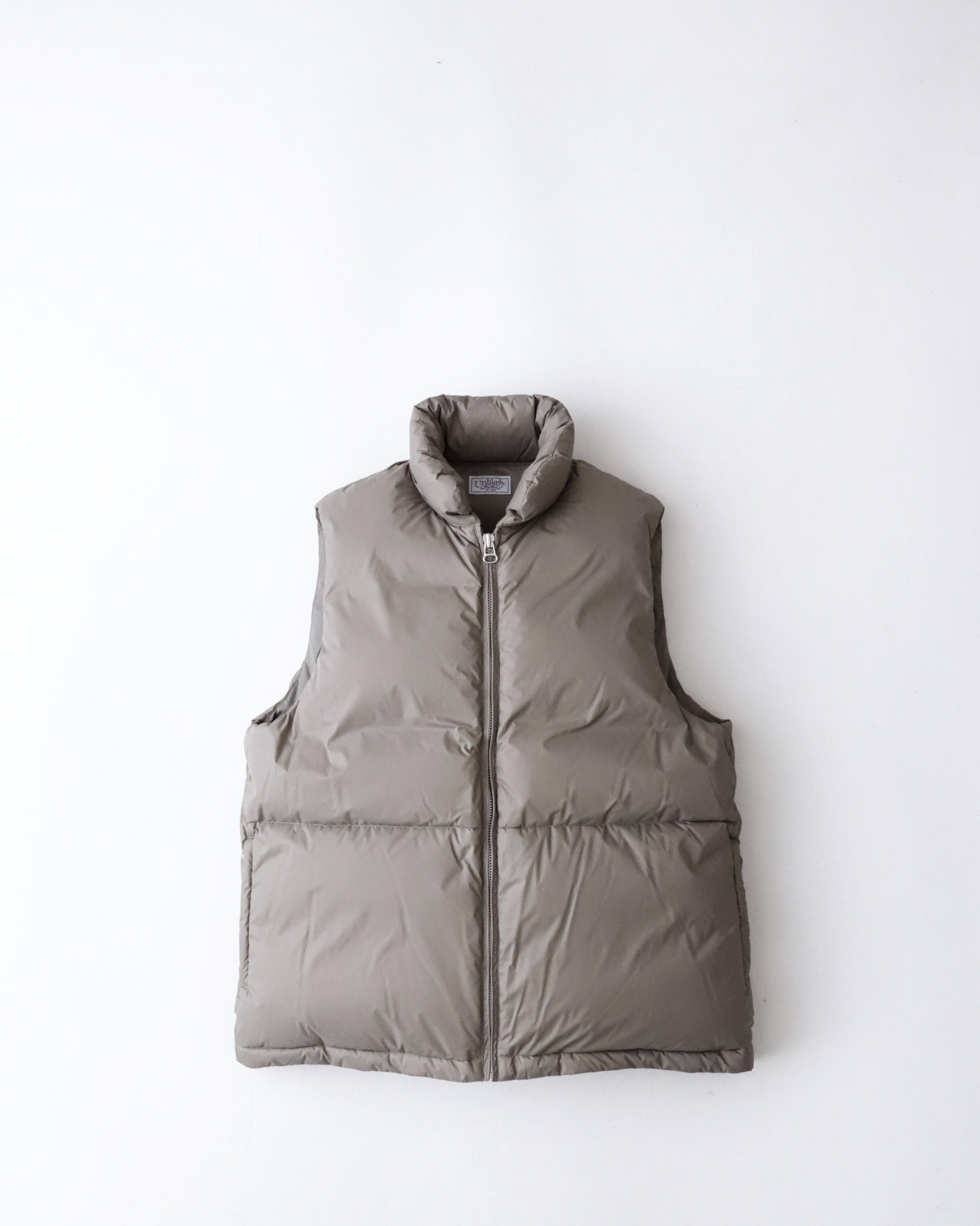 UNLIKELY SIMPLE DOWN VEST