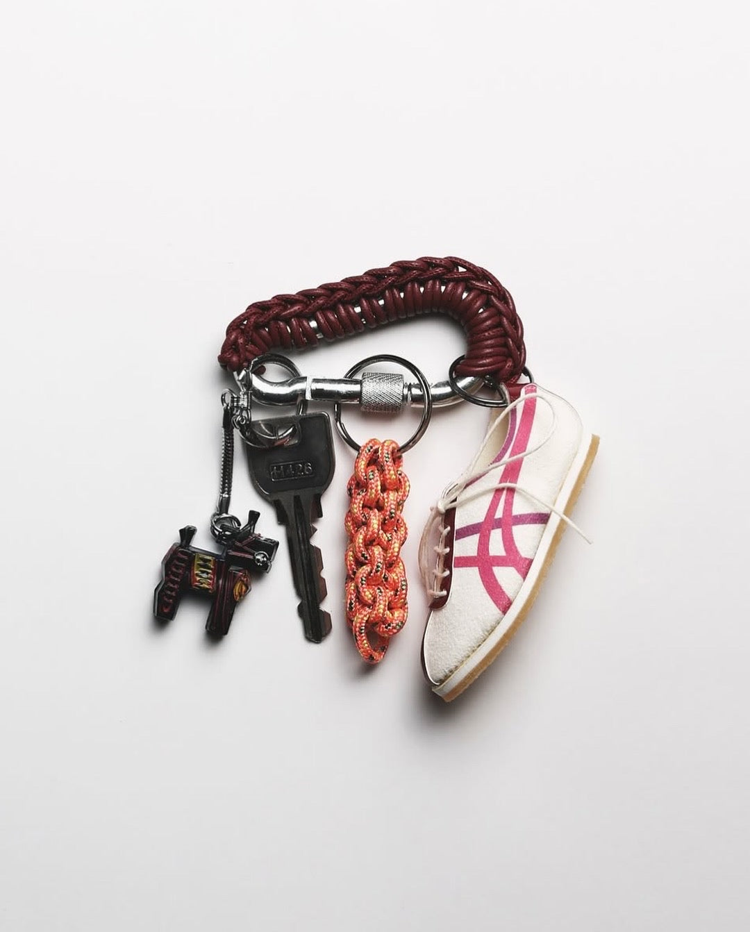 COGNAC LEATHER CARABINER BY AURELIE MATHIGOT
