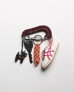COGNAC LEATHER CARABINER BY AURELIE MATHIGOT