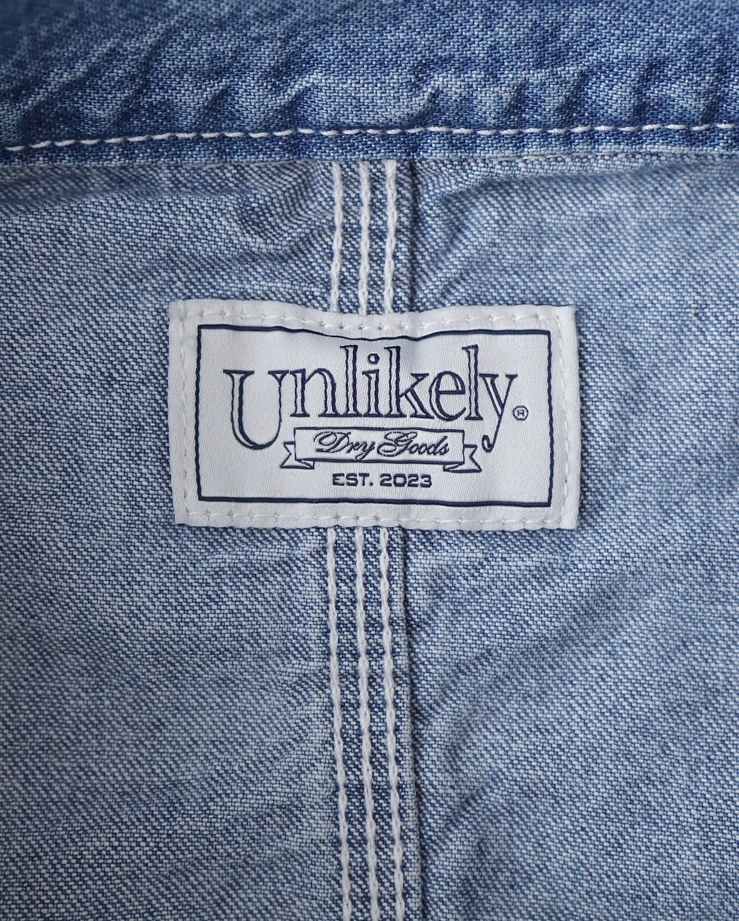 UNLIKELY CHOPPED COVERALL TOPS