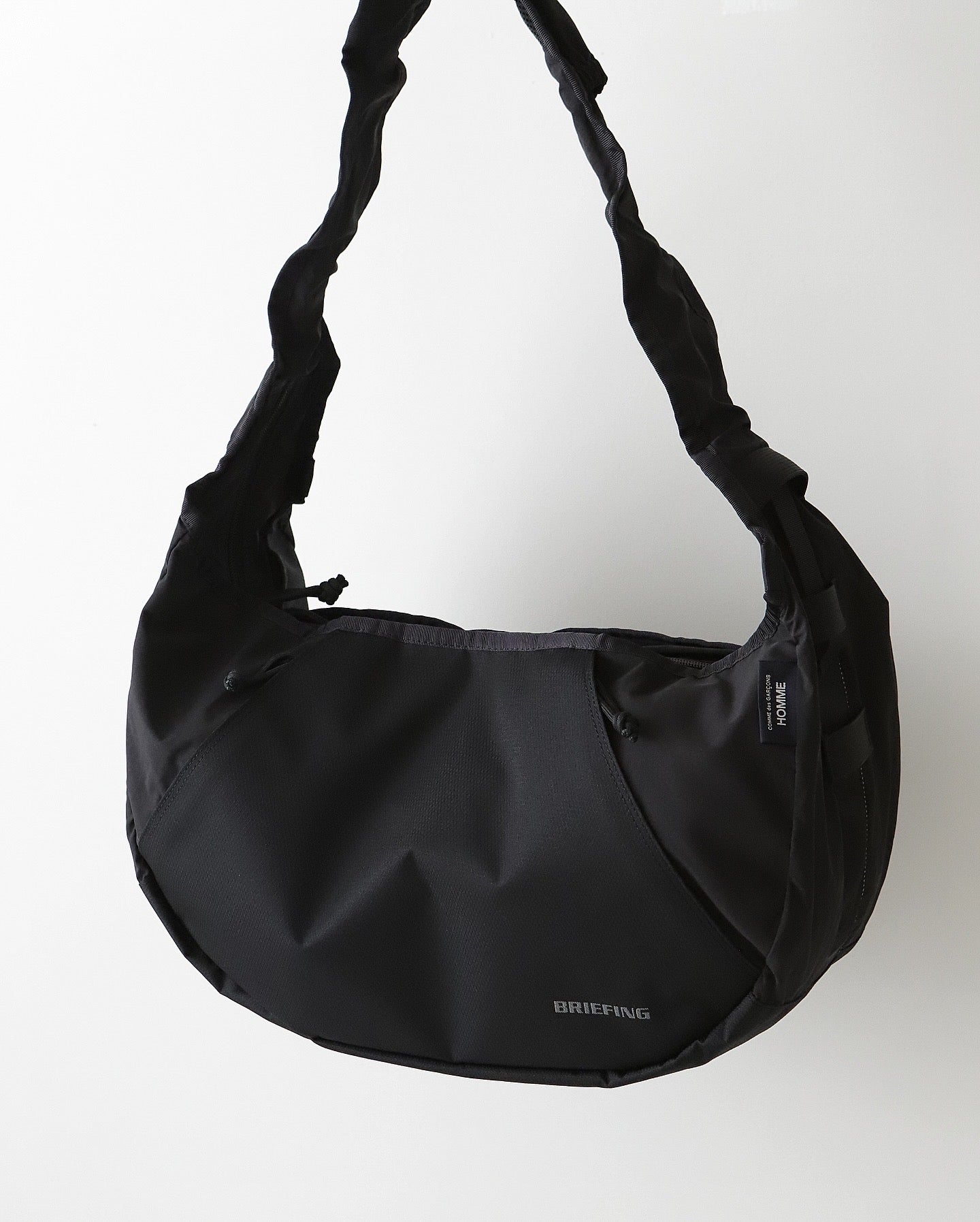 BRIEFINGS SLING BAG｜ESTER CORDURA DIA RIP × SUEDE NYLON ESTER