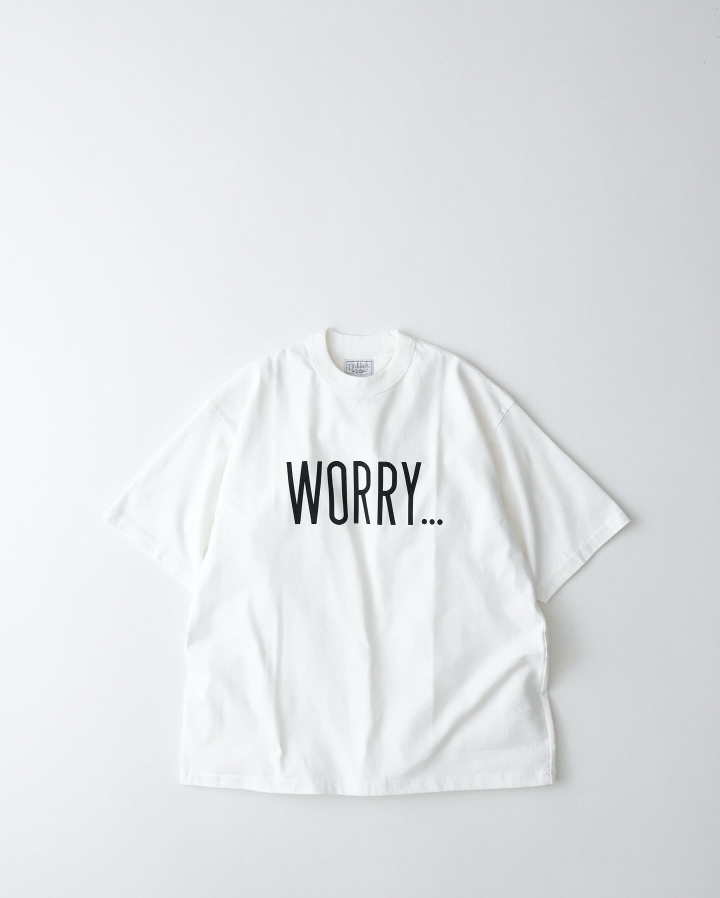 UNLIKELY AUTHENTIC GRAPHIC TEE "WORRY..."
