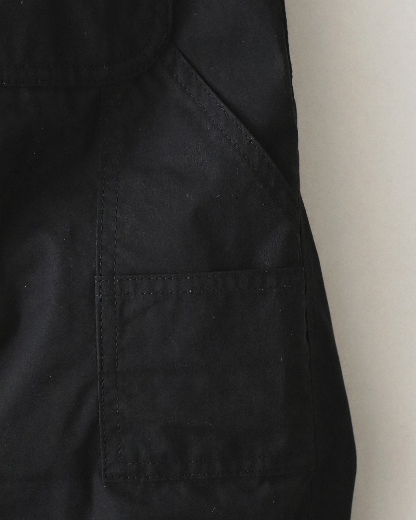 PLEATED LEG TROUSERS