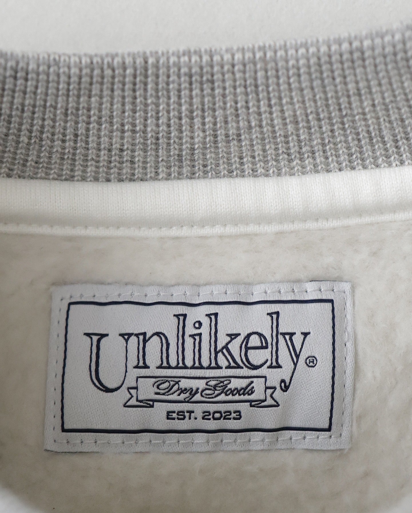 UNLIKELY SIMPLE SWEAT CREW "RESERVE"