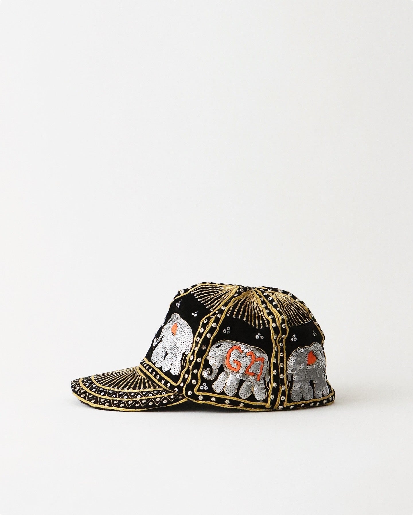 ELEPHANT SEQUIN CAPS BRONZE