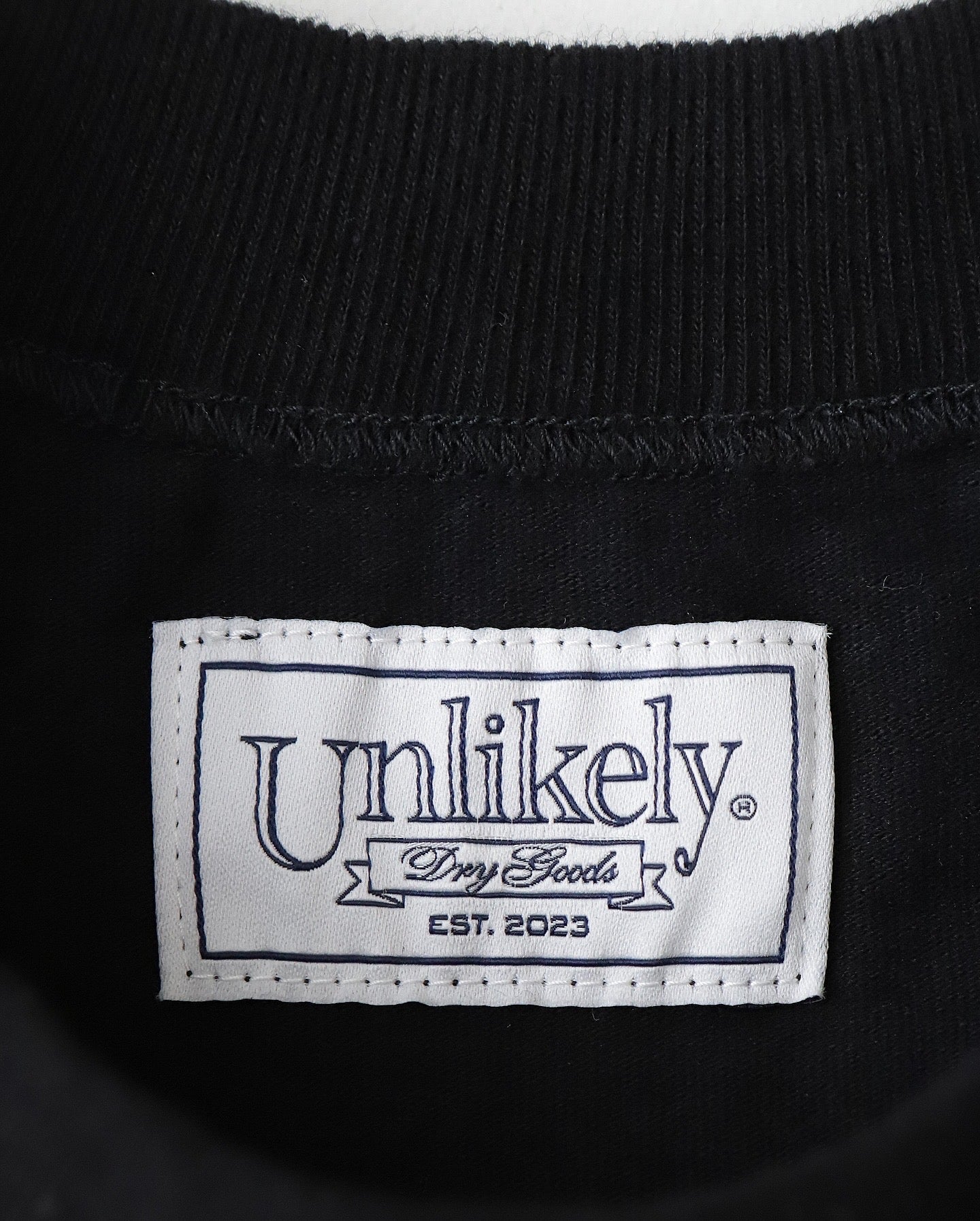 UNLIKELY AUTHENTIC GRAPHIC TEE "WORRY..."