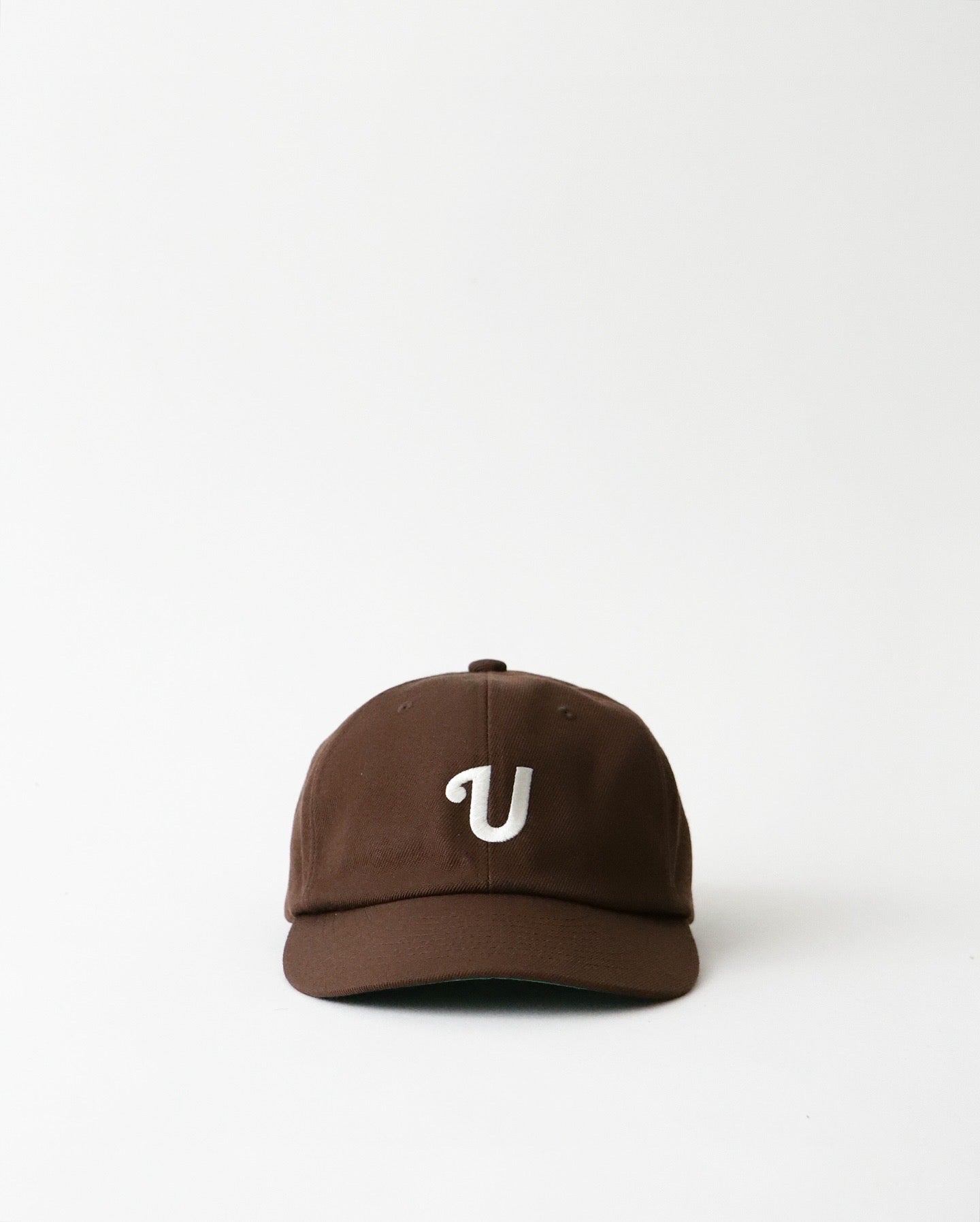 UNLIKELY TEAM CAP
