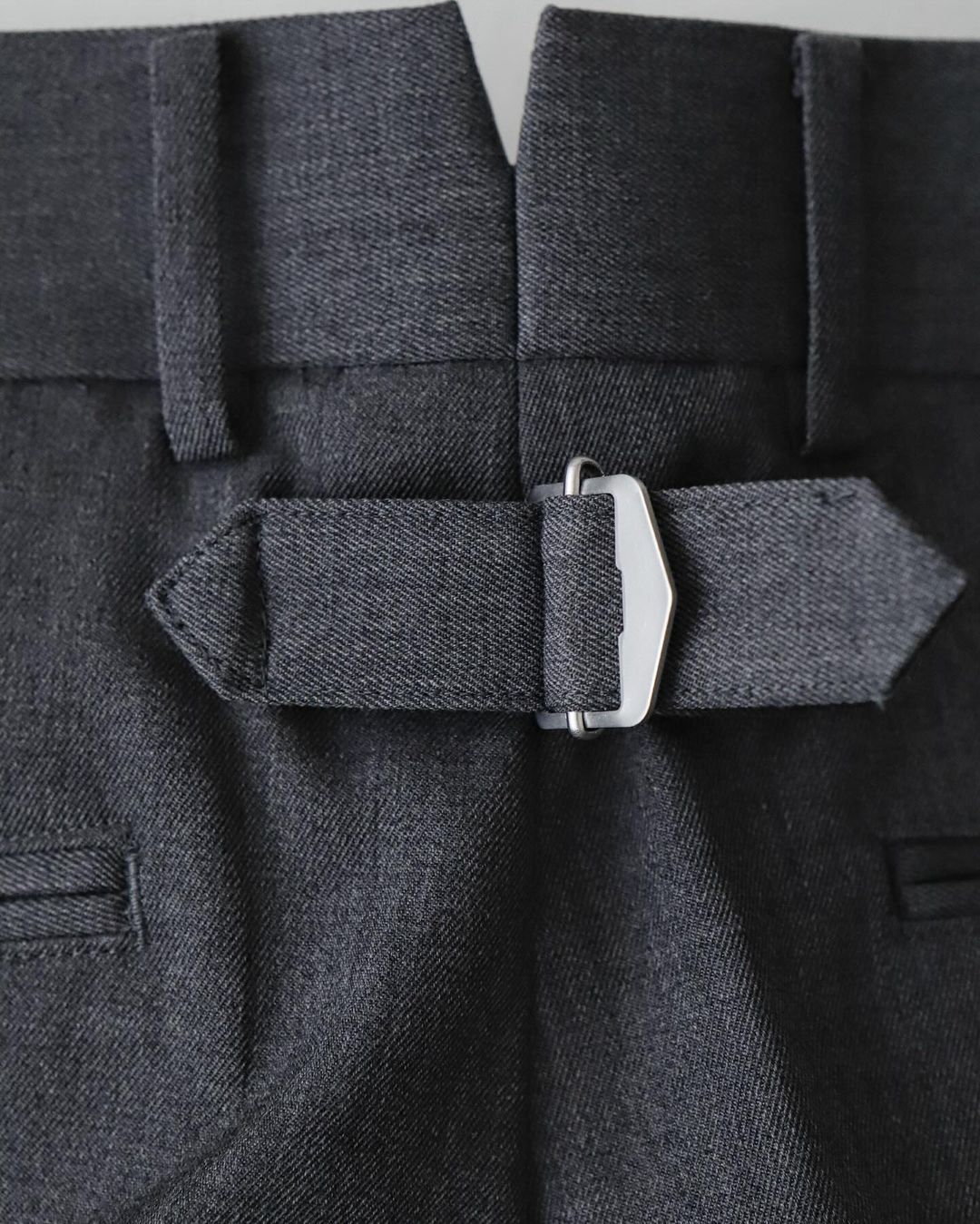 UNLIKELY BACK STRAP PLAIN FRONT TROUSERS WOOL SERGE