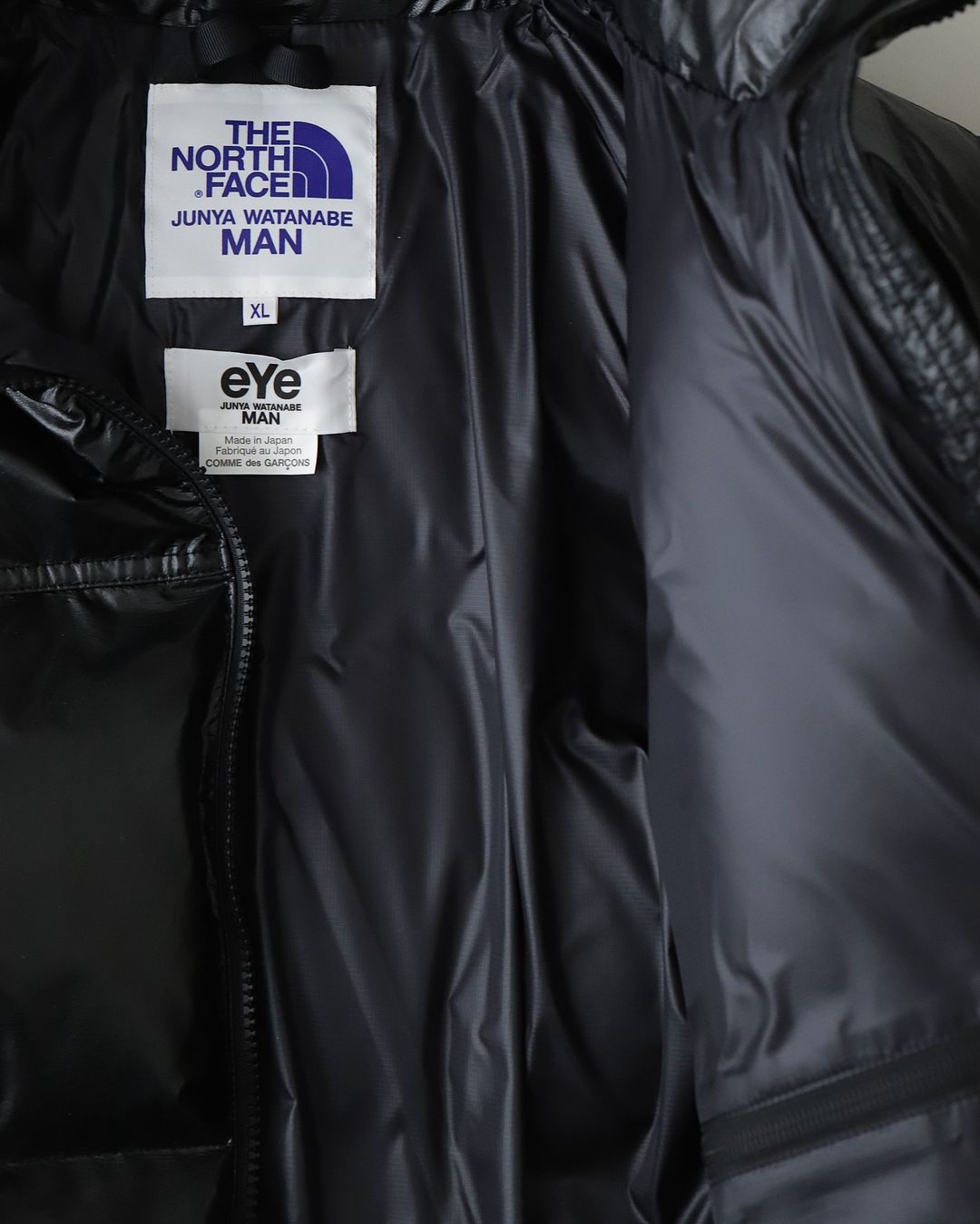 THE NORTH FACE SYNTHETIC LEATHER NUPTSE JACKET