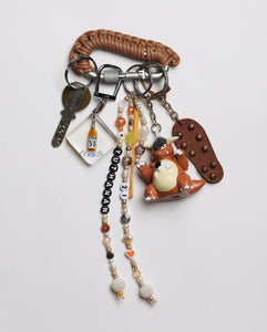 BROWN LEATHER CARABINER BY AURELIE MATHIGOT